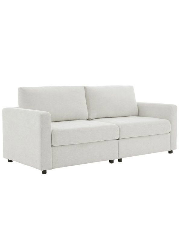 Mick Jagger’s timeless pillow trick instantly transforms an outdated couch