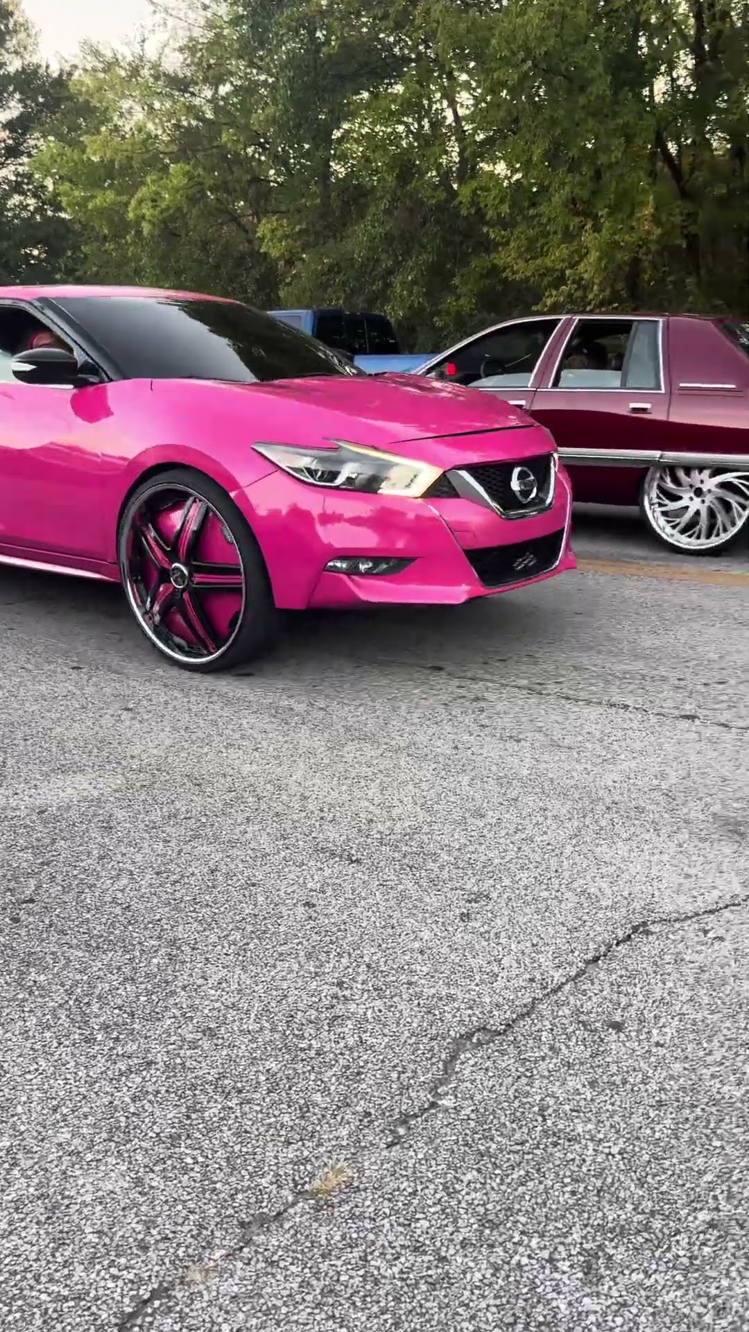 Nissan Maxima on 26” DUB floaters riding
