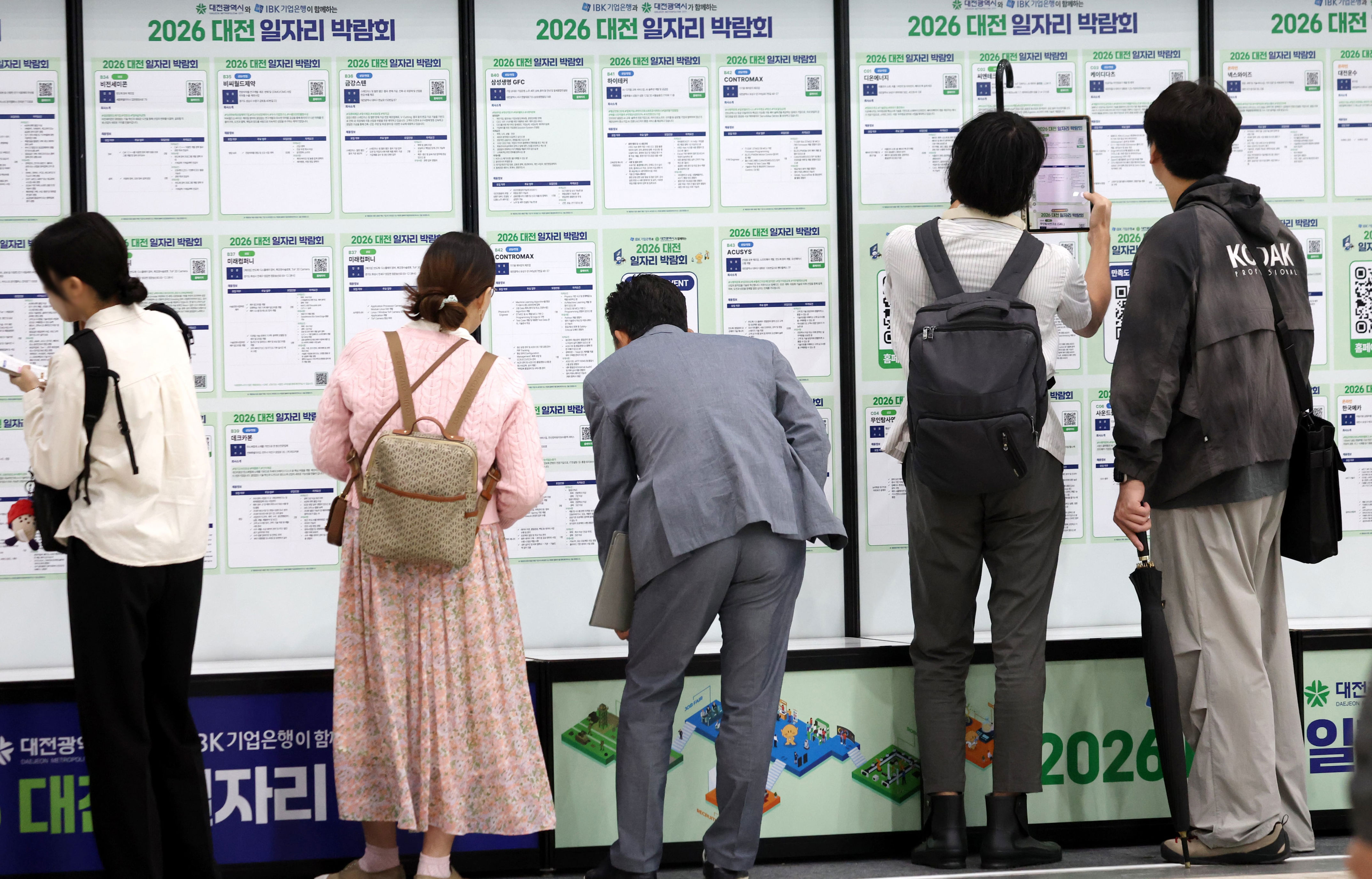 Strong growth on paper, hard times for households
