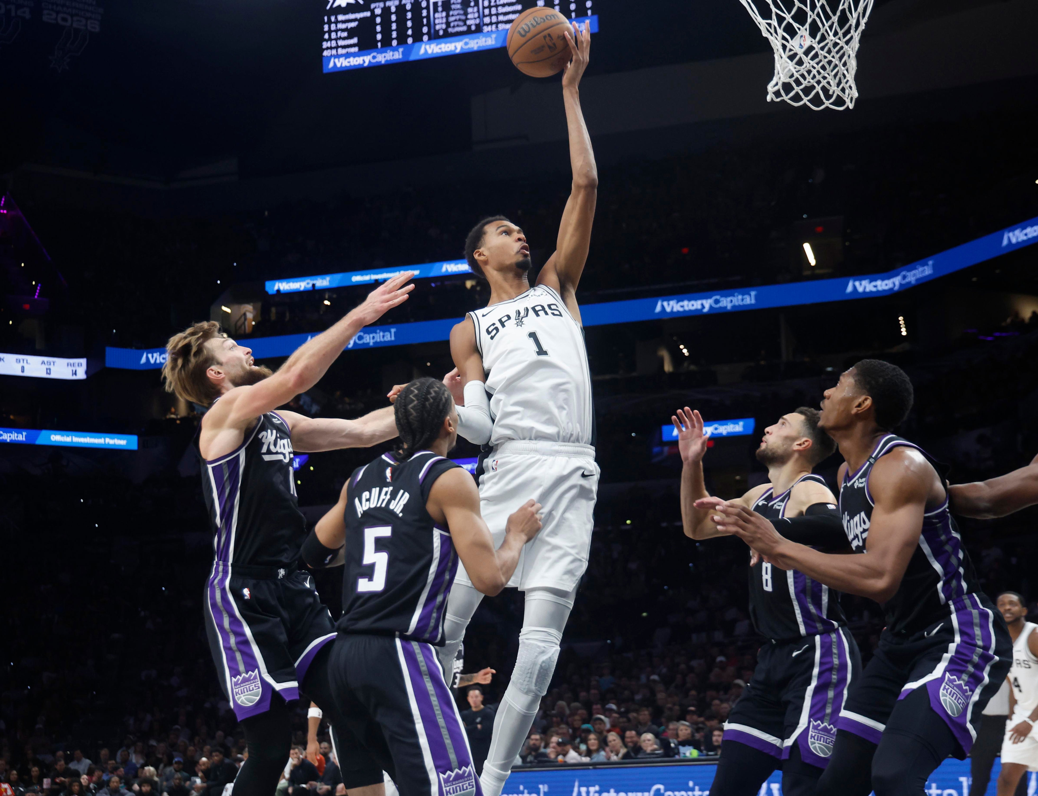 Spurs rout shorthanded Kings for second consecutive win