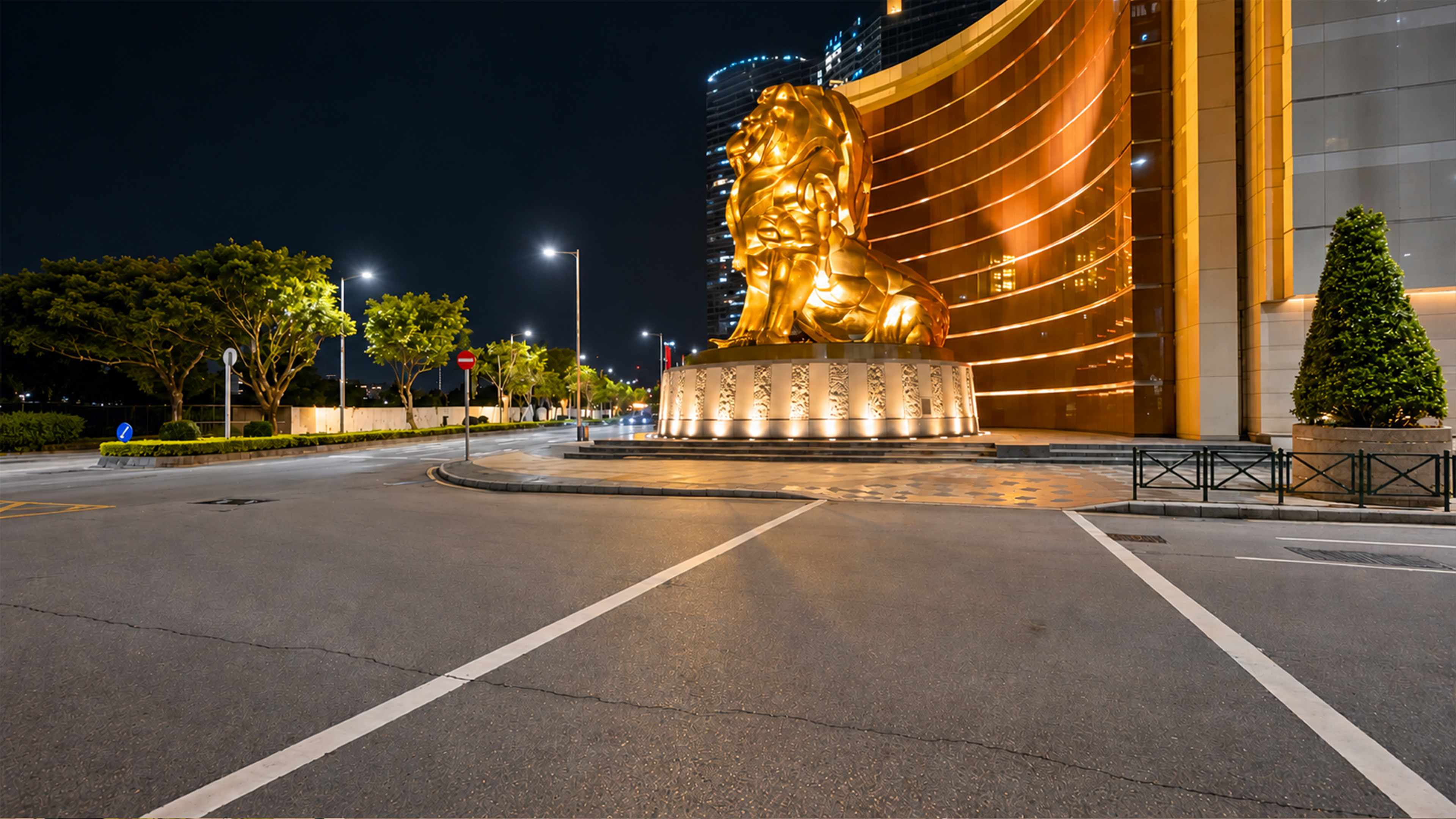 A massive golden lion stands outside this Macau casino