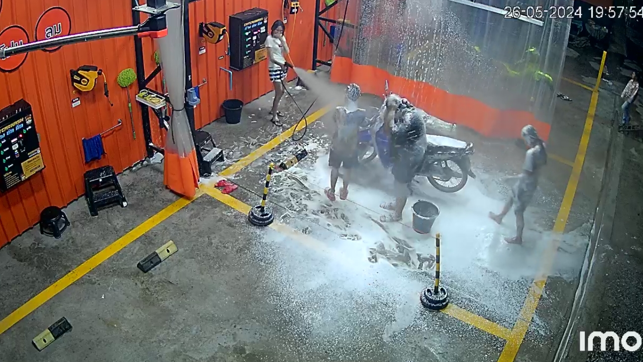 Customers enjoy a unique soapy bath experience at Suphan Buri car wash