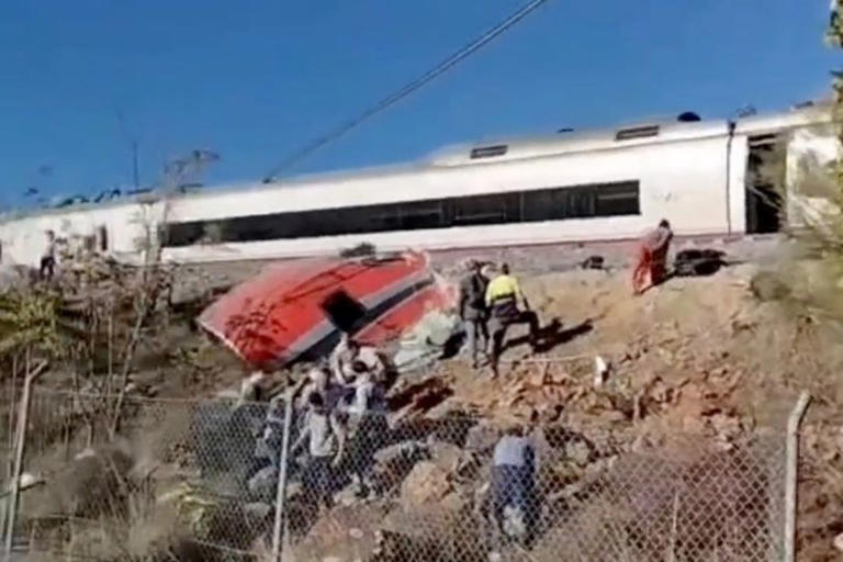 64 dead in horror high-speed train crash as carriages plunge down ...