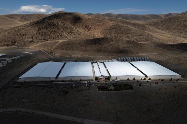 Drone view of data centers at the Apple Sparks Campus in Sparks, Nevada, US, October 9, 2026. On more than 100,000 acres of Nevada desert east of Reno, one of the world's largest concentrations of data centers is taking shape, providing years of work for thousands of electricians, pipefitters and other union tradespeople who are building it. REUTERS/Daniel Cole