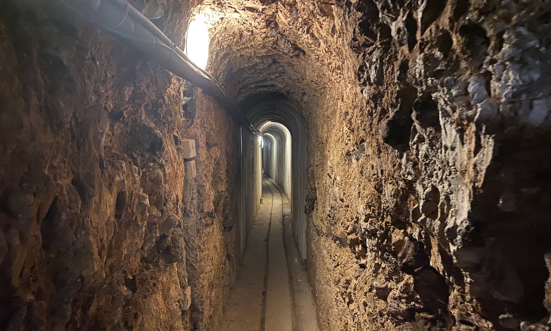 House with underground network of passages dug for family fun sells for ...
