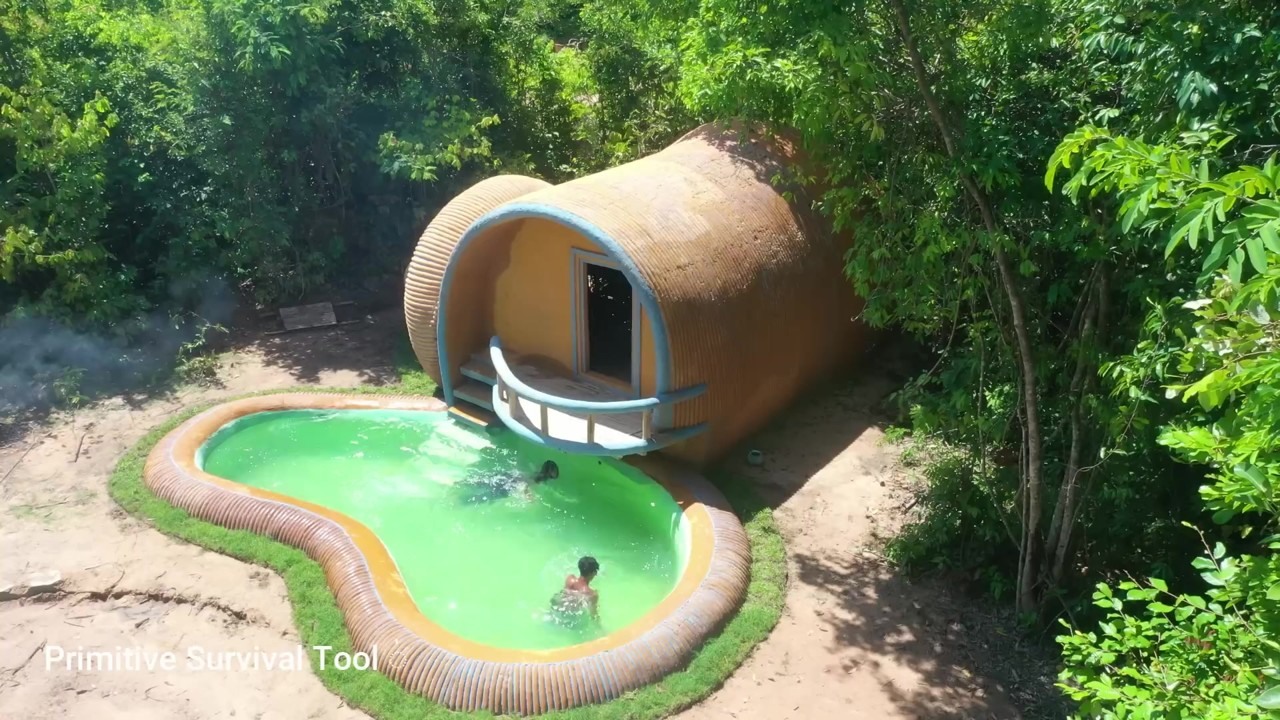 Jungle snail villa from above with a curved pool
