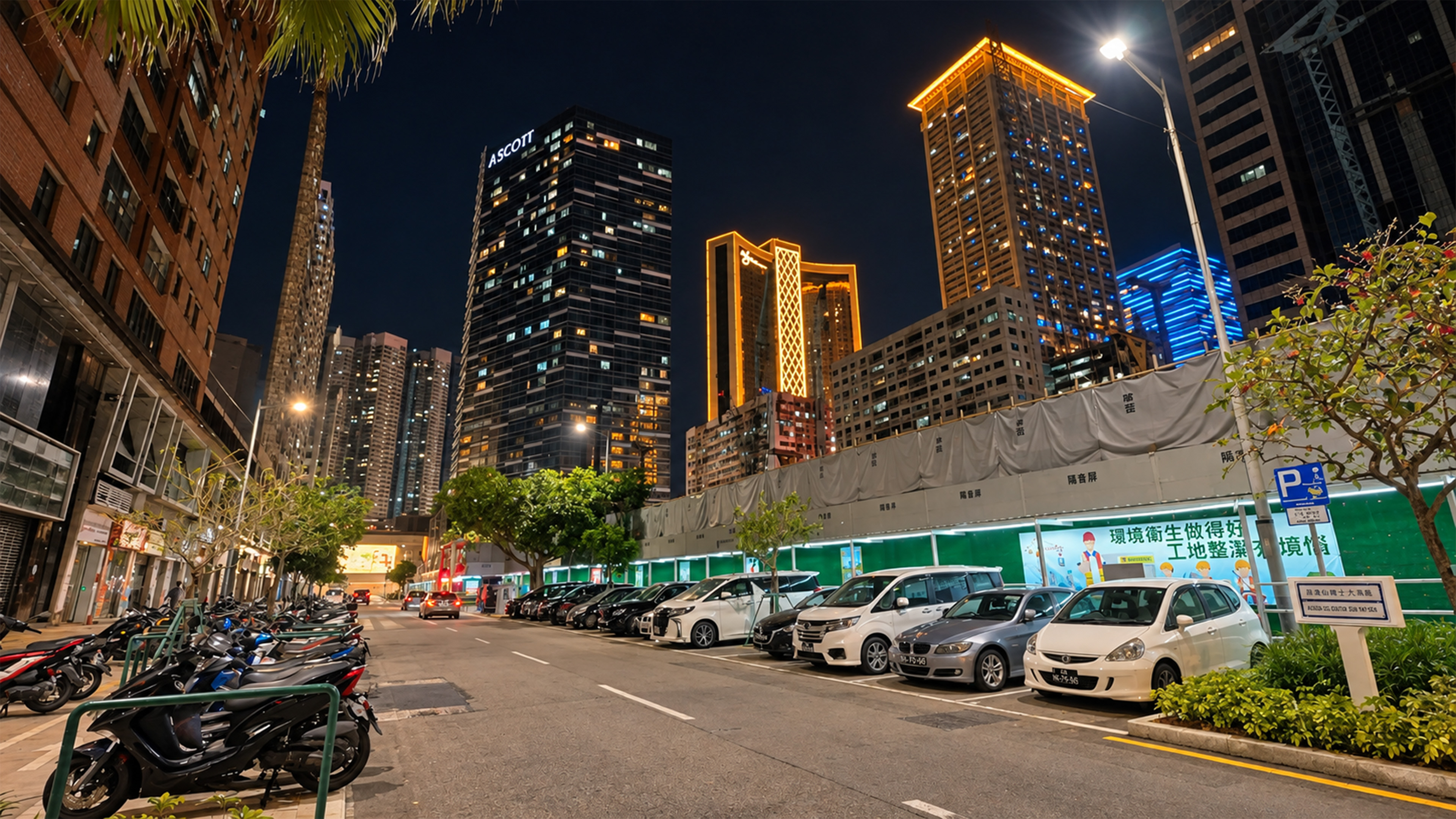 Macau's night skyline features towers glowing in gold and blue