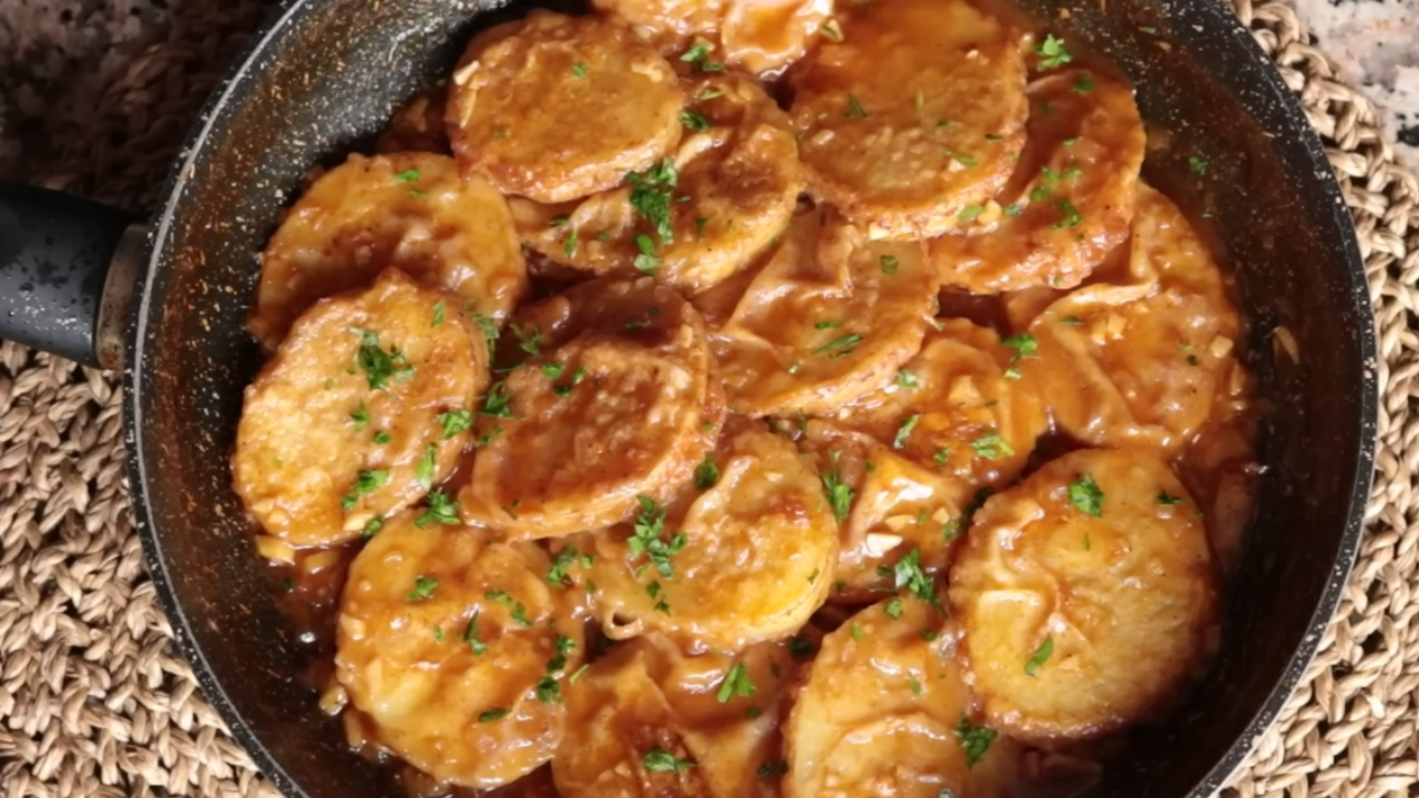 Spanish potatoes in rich sauce