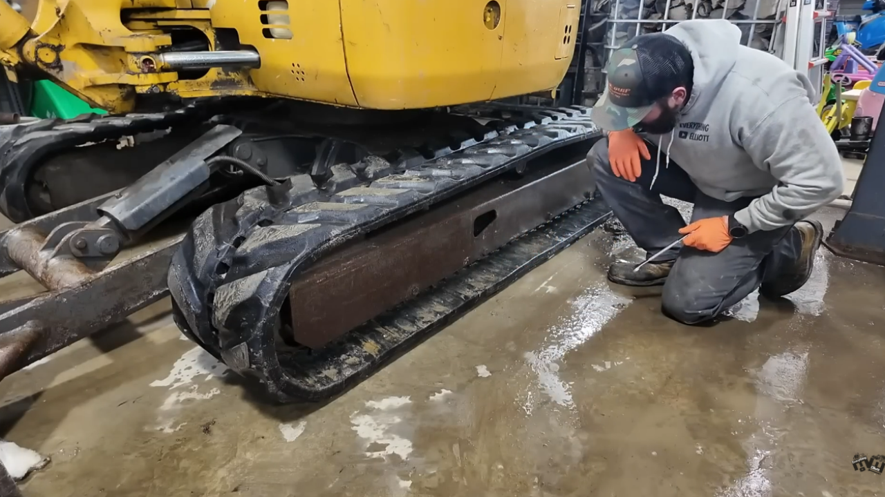 Replacing track rollers on a John Deere mini excavator