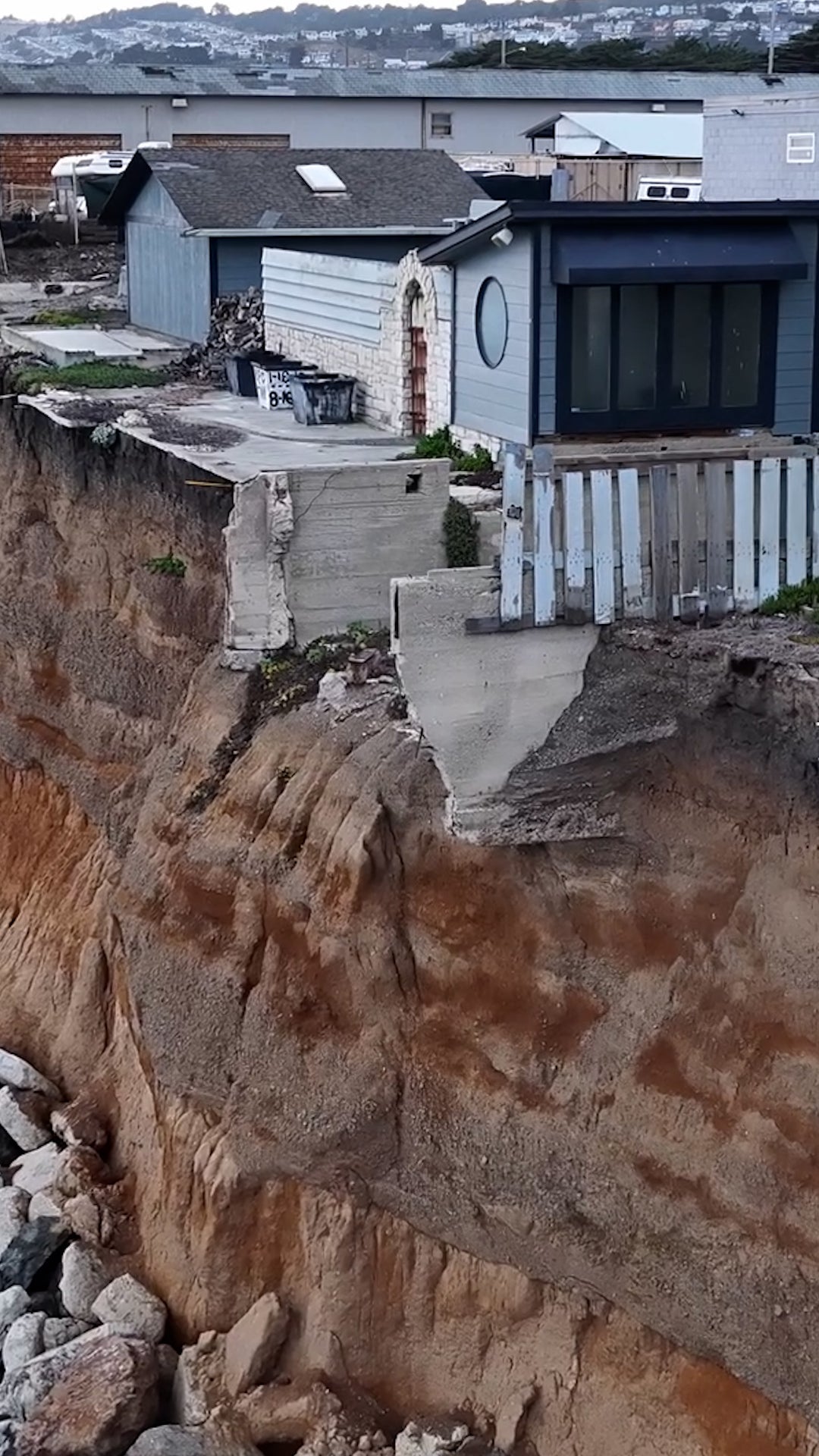 Cliffside buildings near collapse