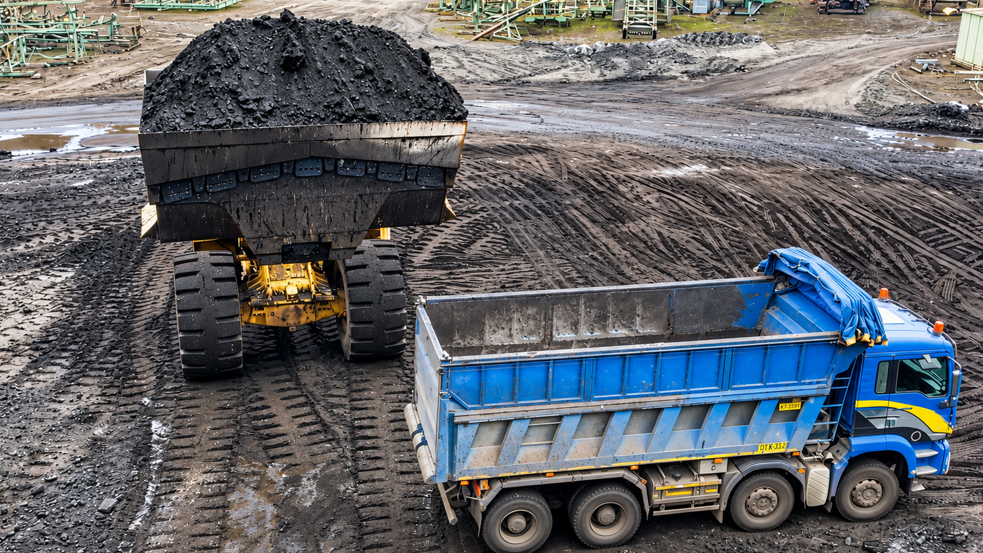 Watch how an 800-hp Cat 992G wheel loader fills coal tipper trucks in ...