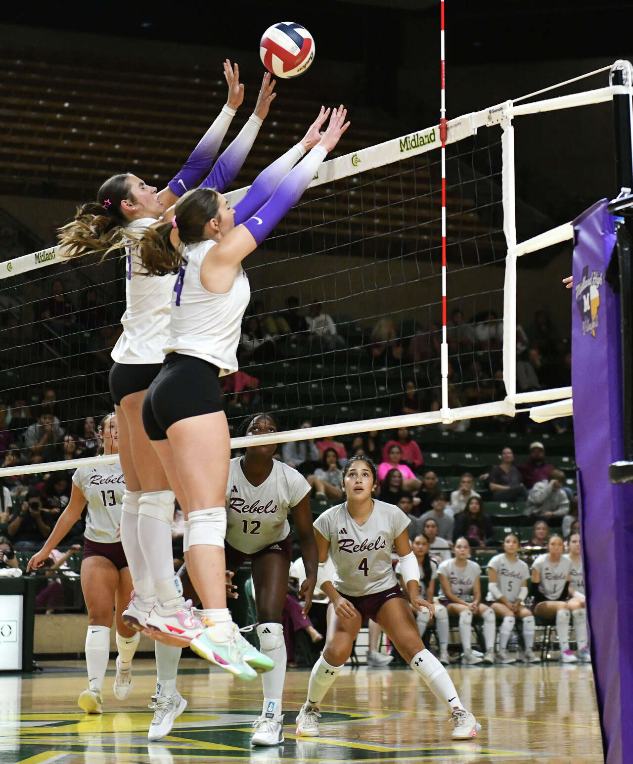 Johnston a presence in the middle for Midland High volleyball