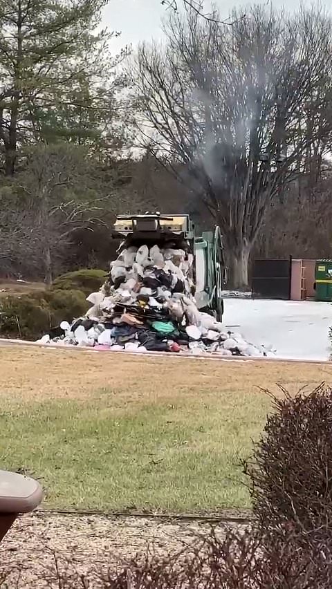 Quick-thinking garbage truck driver dumps burning trash