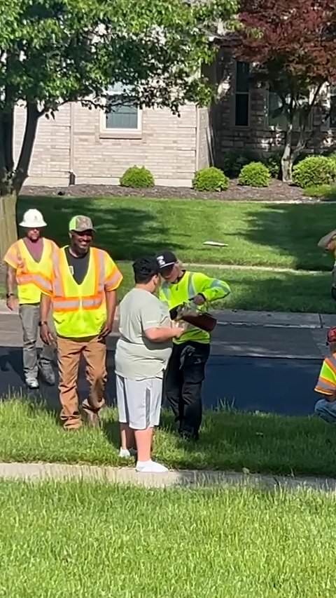Thoughtful child makes iced tea for construction workers