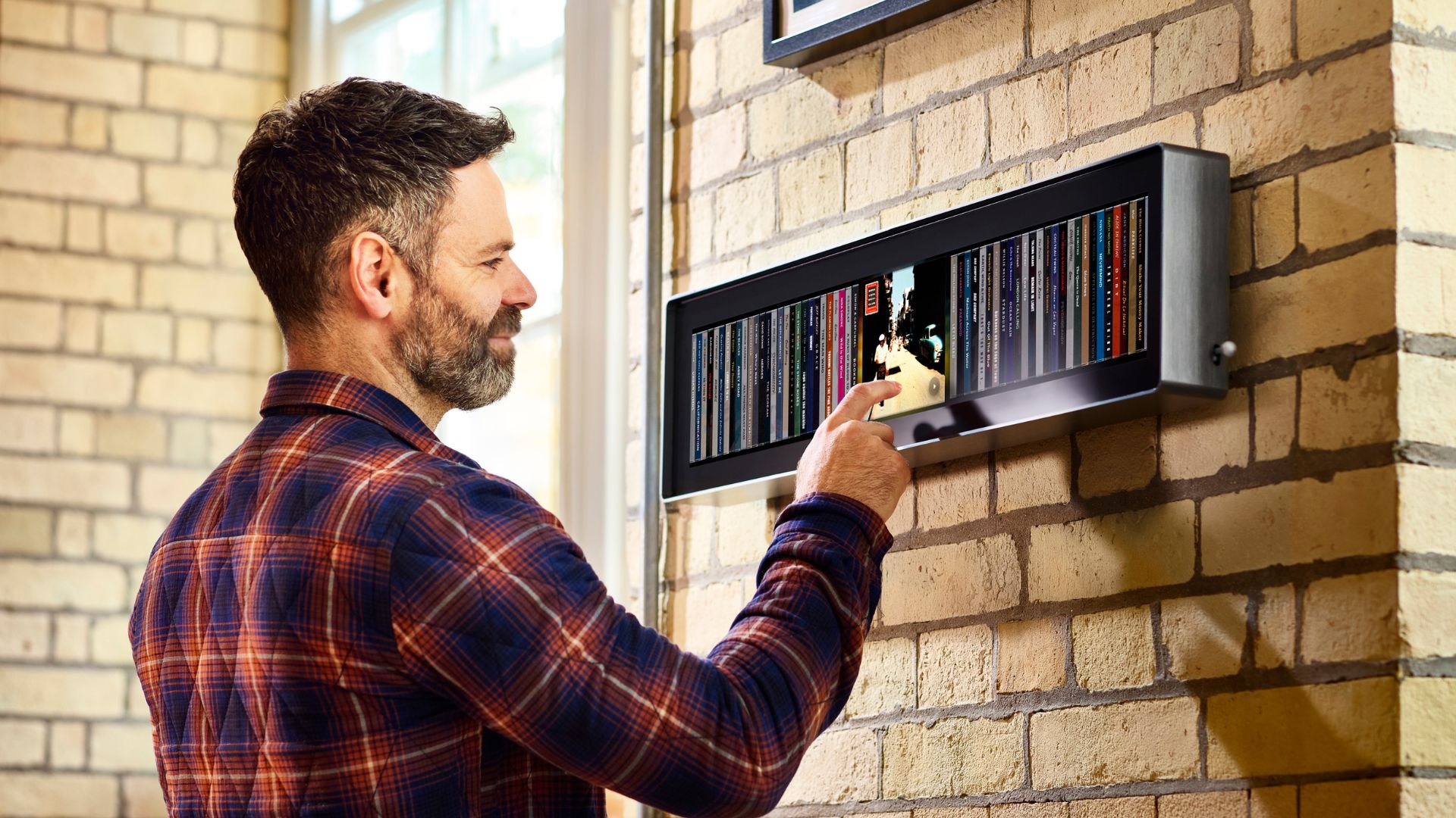 Spine is a 28-inch display that turns your streaming library into a ...