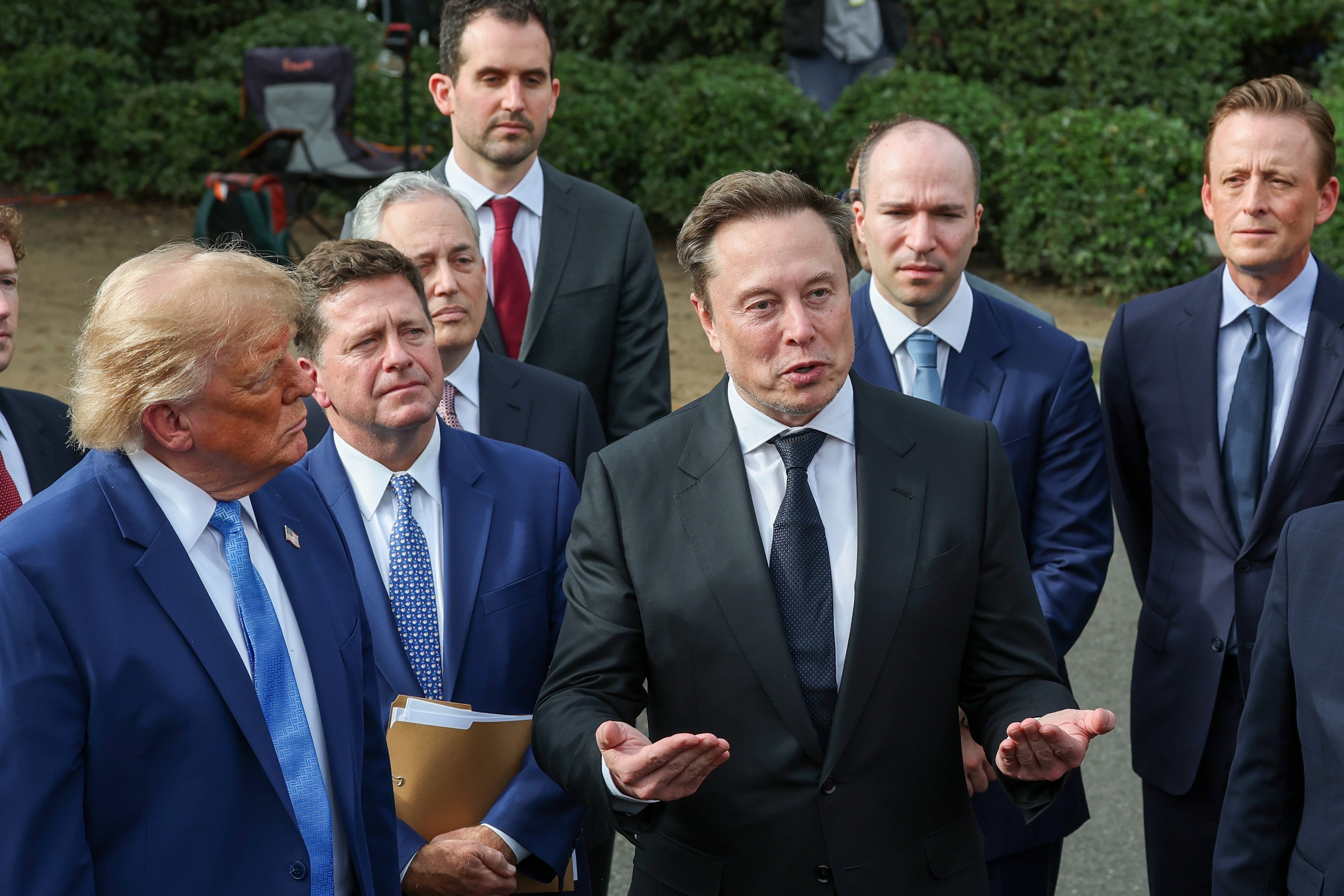 Musk says AI and robots could bring 'universal high income' while ...