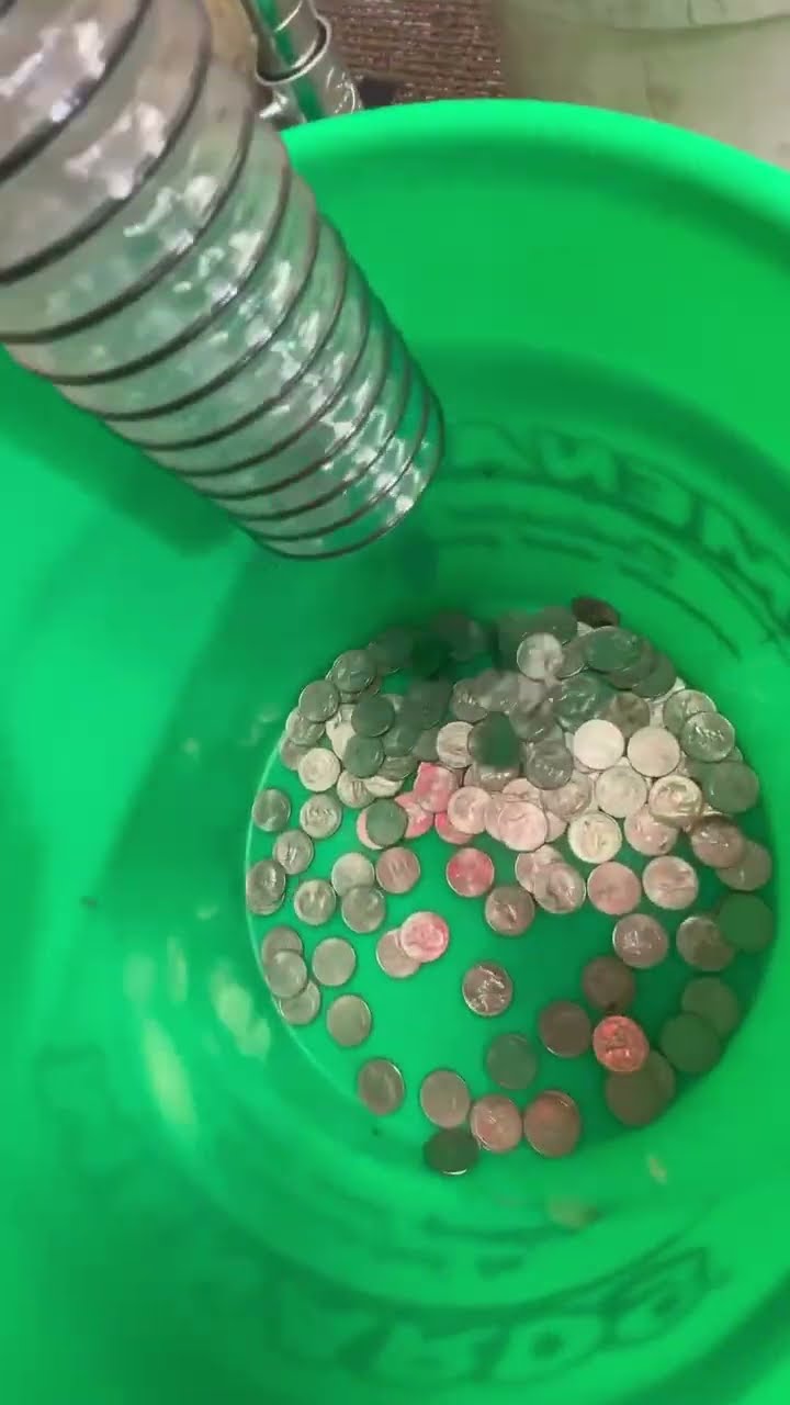 Arcade coin pusher profits: counting $800+ in quarters!