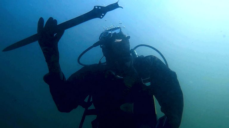 3,300-year-old sword discovered in an Italian lake may have been dumped ...
