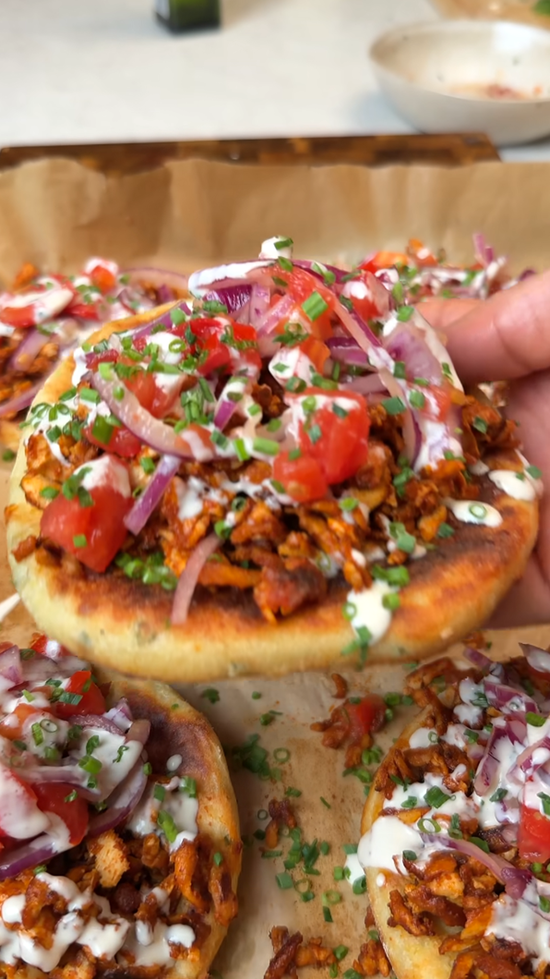 Crispy potato cakes topped with smoky glazed tofu