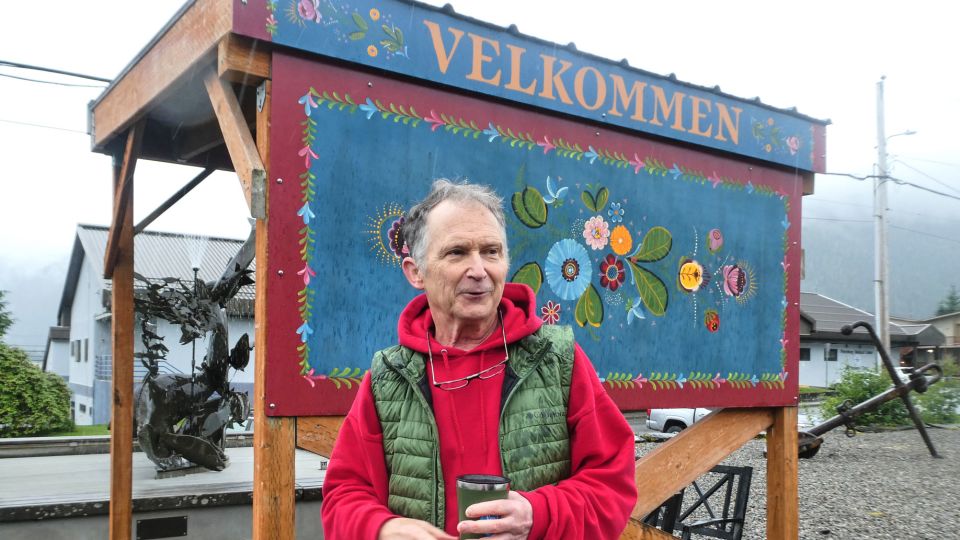 Dan Sullivan, a candidate in Alaska's US Senate race who shares a name with the incumbent seeking reelection, talks in front of a welcome sign near downtown Petersburg on July 3, 2026. - Becky Bohrer/AP