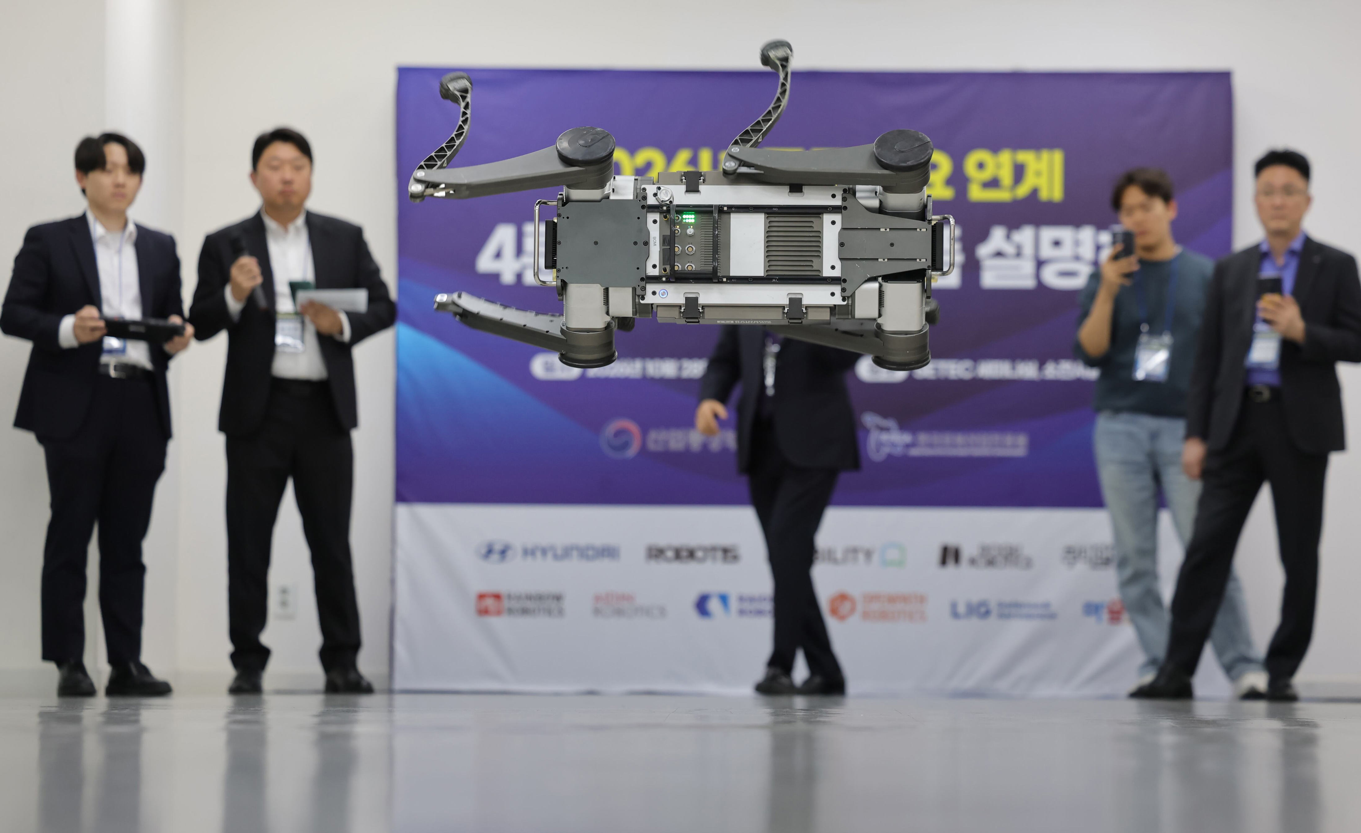 Robot dog job fair links government, manufacturers