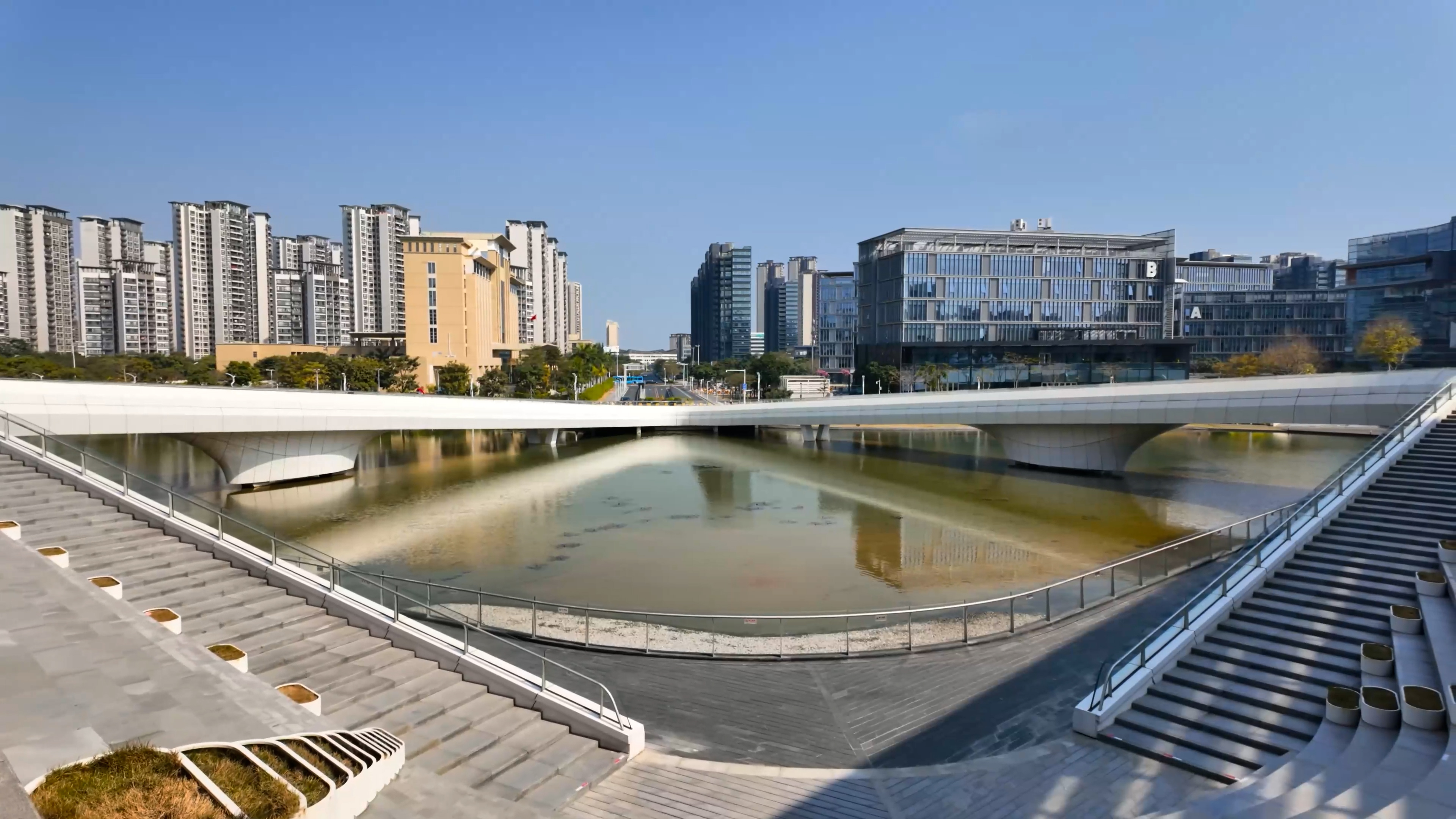 White bridge in China connects two giant waterfront staircases