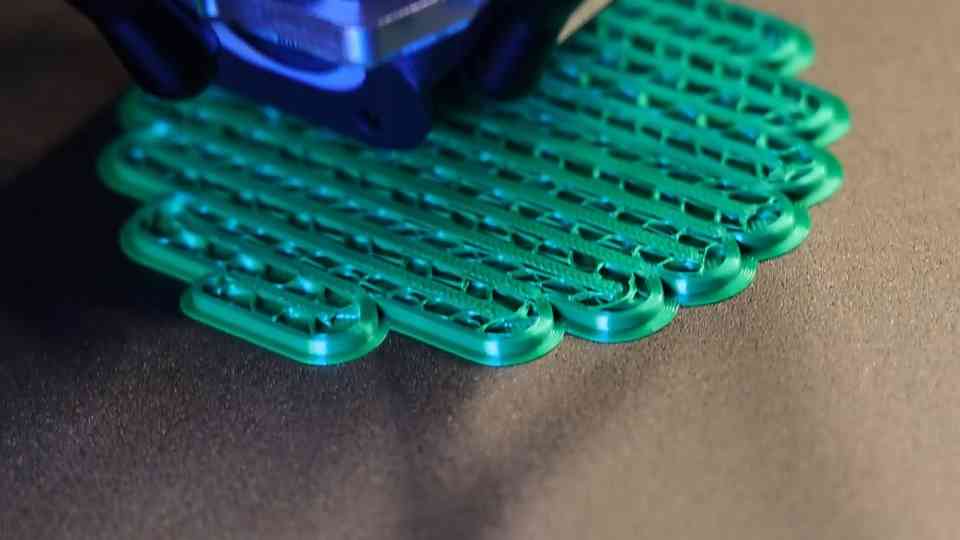 3D printed extrusion coaster with a distinctive textured design