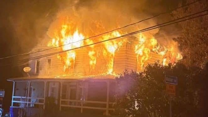 Multi-apartment building above auto repair shop damaged by fire