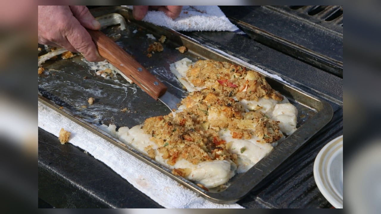 Lobster-stuffed cod fillets on the grill