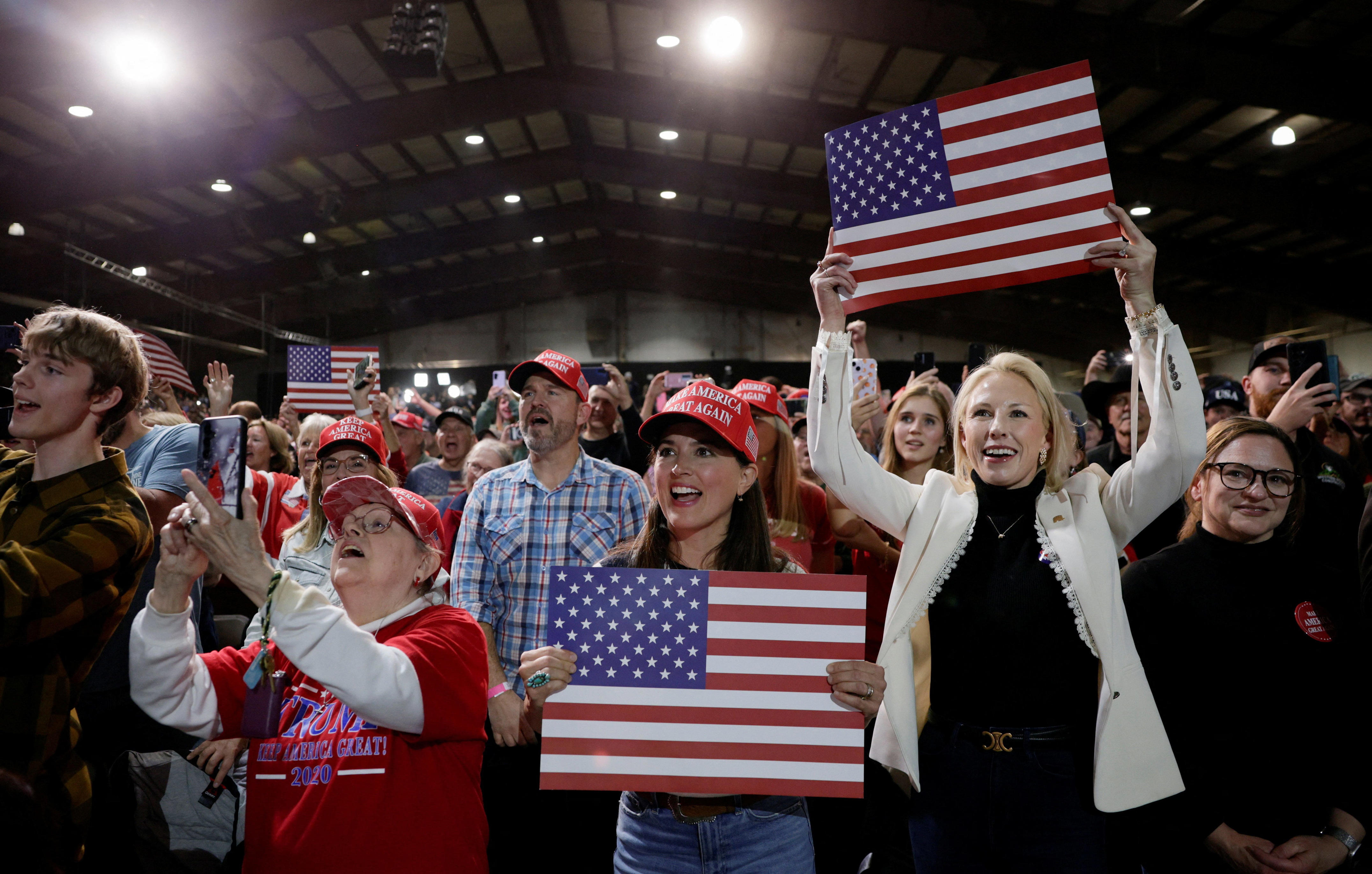 The audience reacts at a campaign rally by US President Donald Trump at the Majestic Valley Arena in Kalispell, Montana, US, October 14, 2026.
