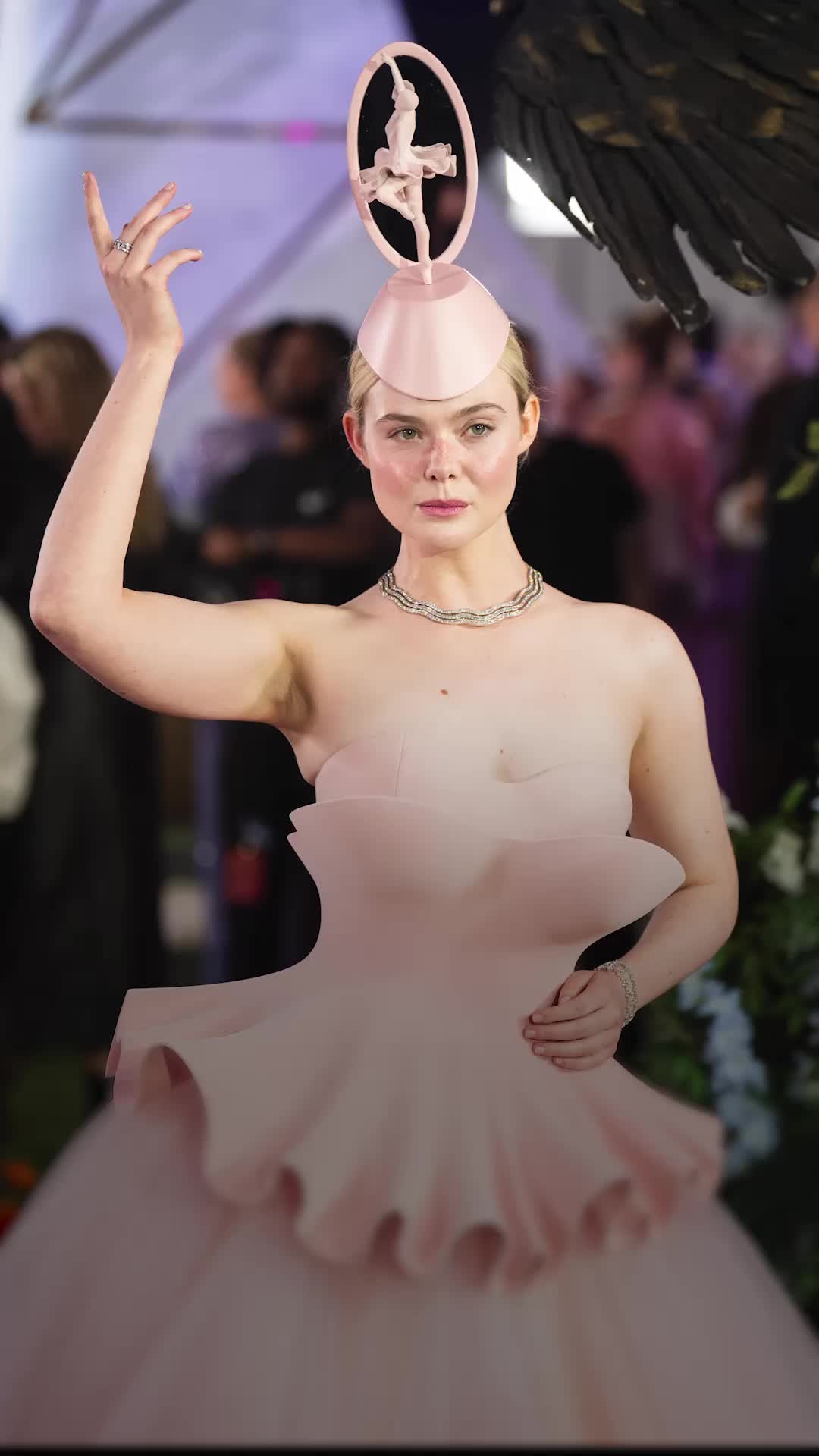 Elle Fanning stuns Hunger Games screening in ballet music box-inspired ...