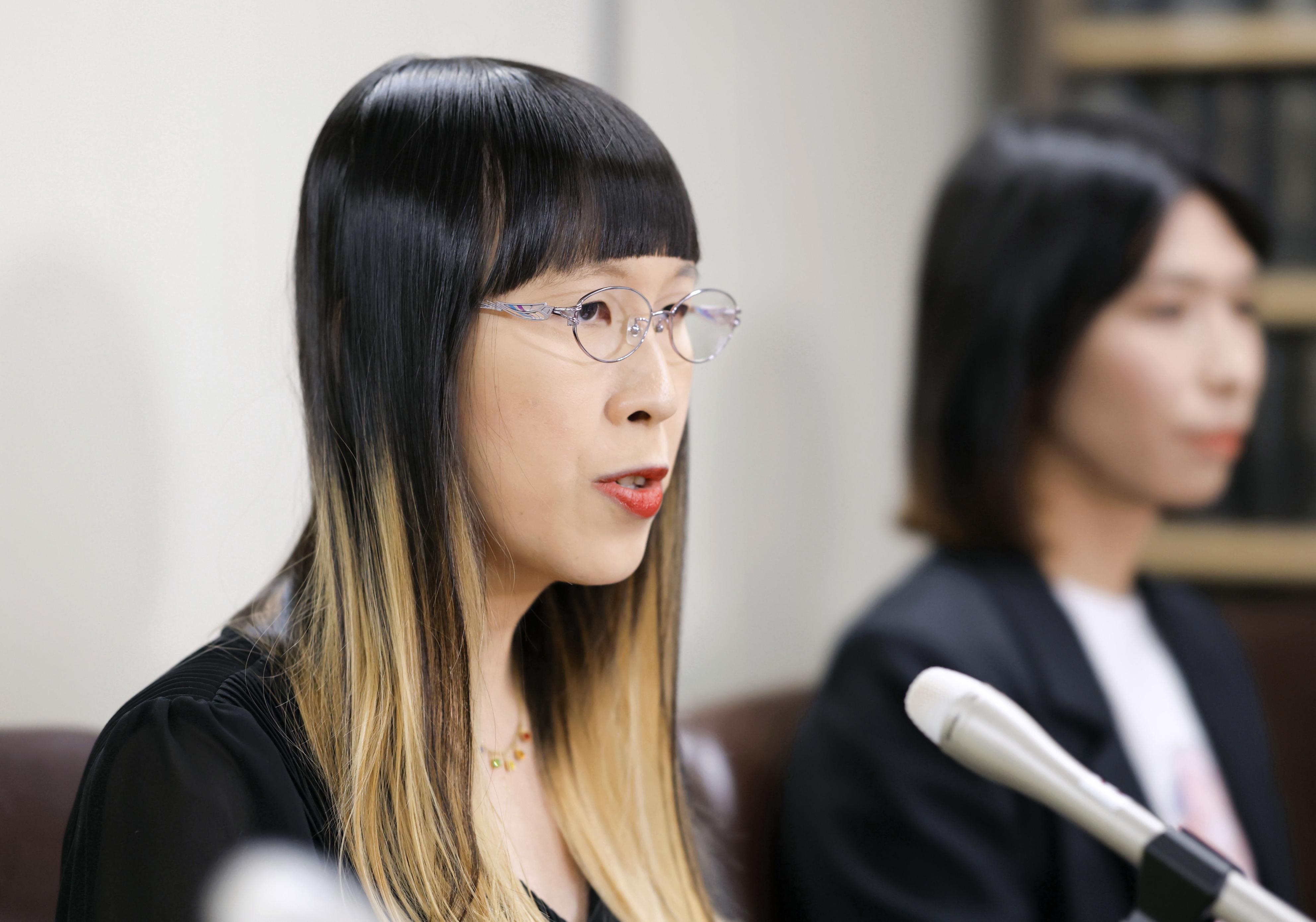 Japan city councilor ordered to pay damages for outing award-winning author