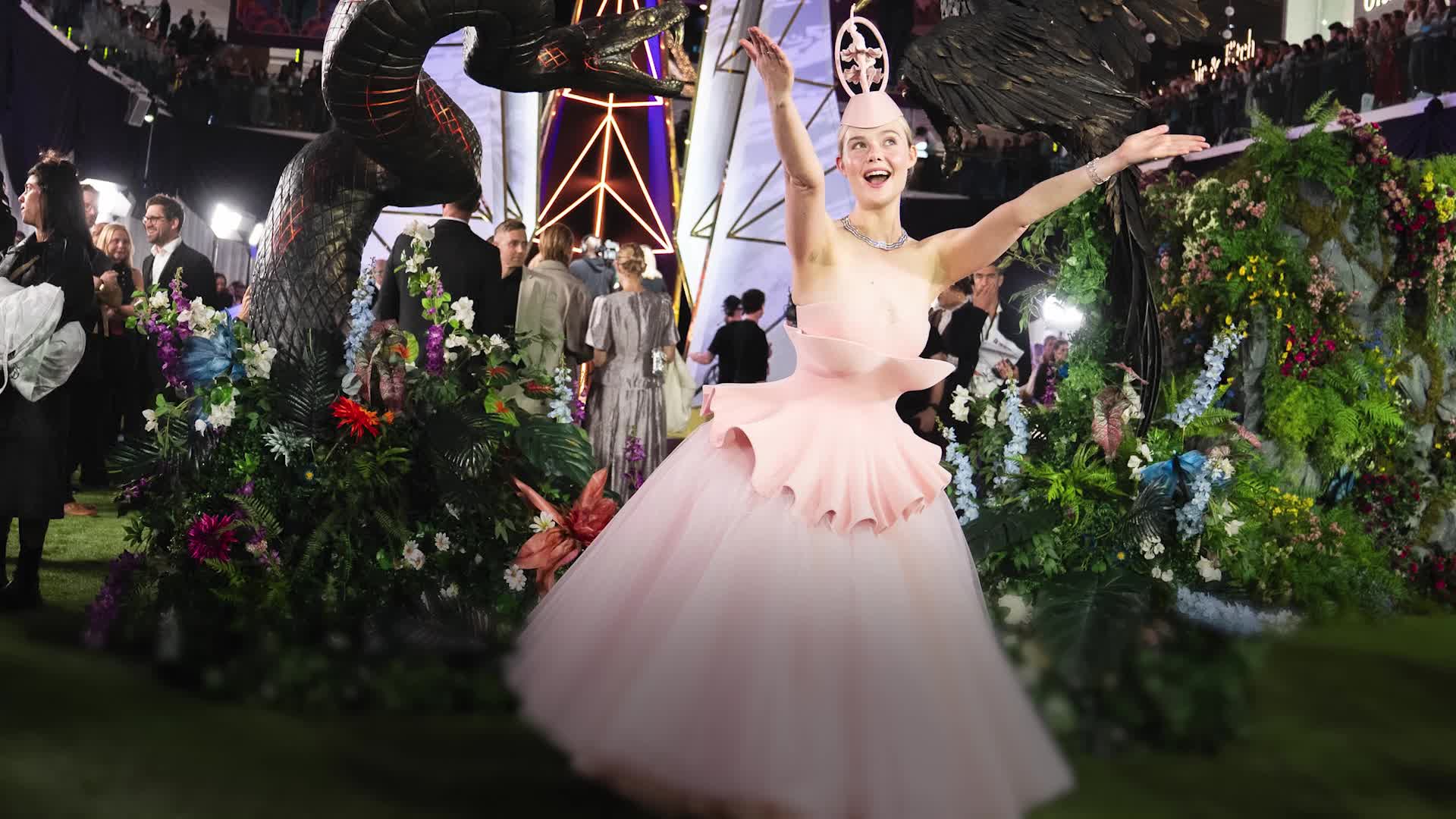 Elle Fanning stuns Hunger Games screening in ballet music box-inspired ...