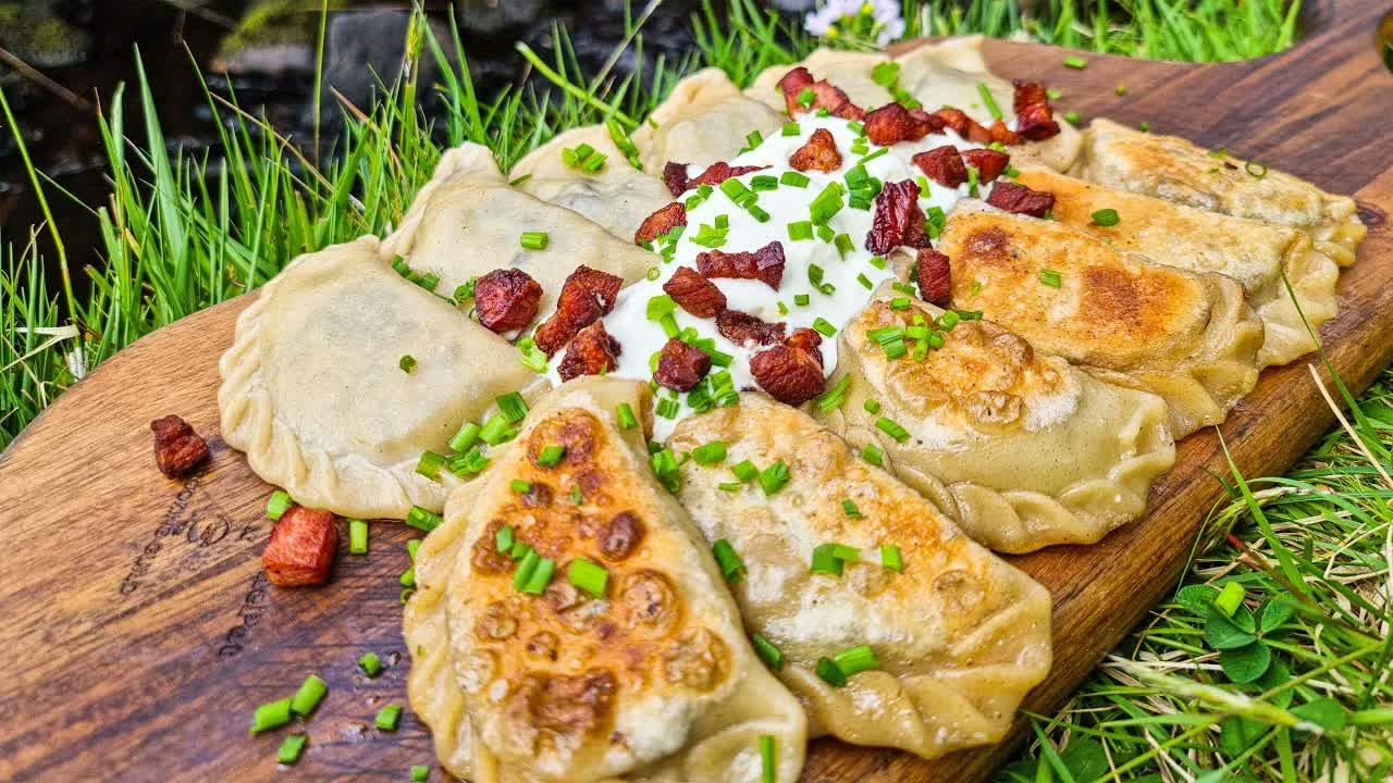 Polish pierogi take shape in an outdoor cooking session