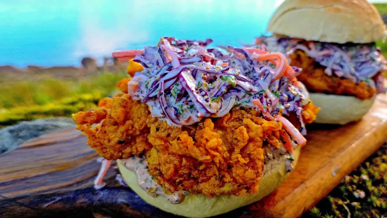 Crispy chicken burgers come together in a forest ASMR cooking session