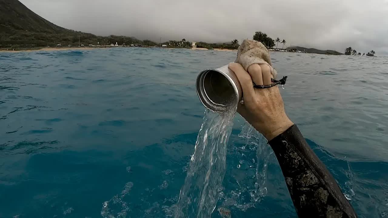 Diver fills bag of trash underwater in only an hour