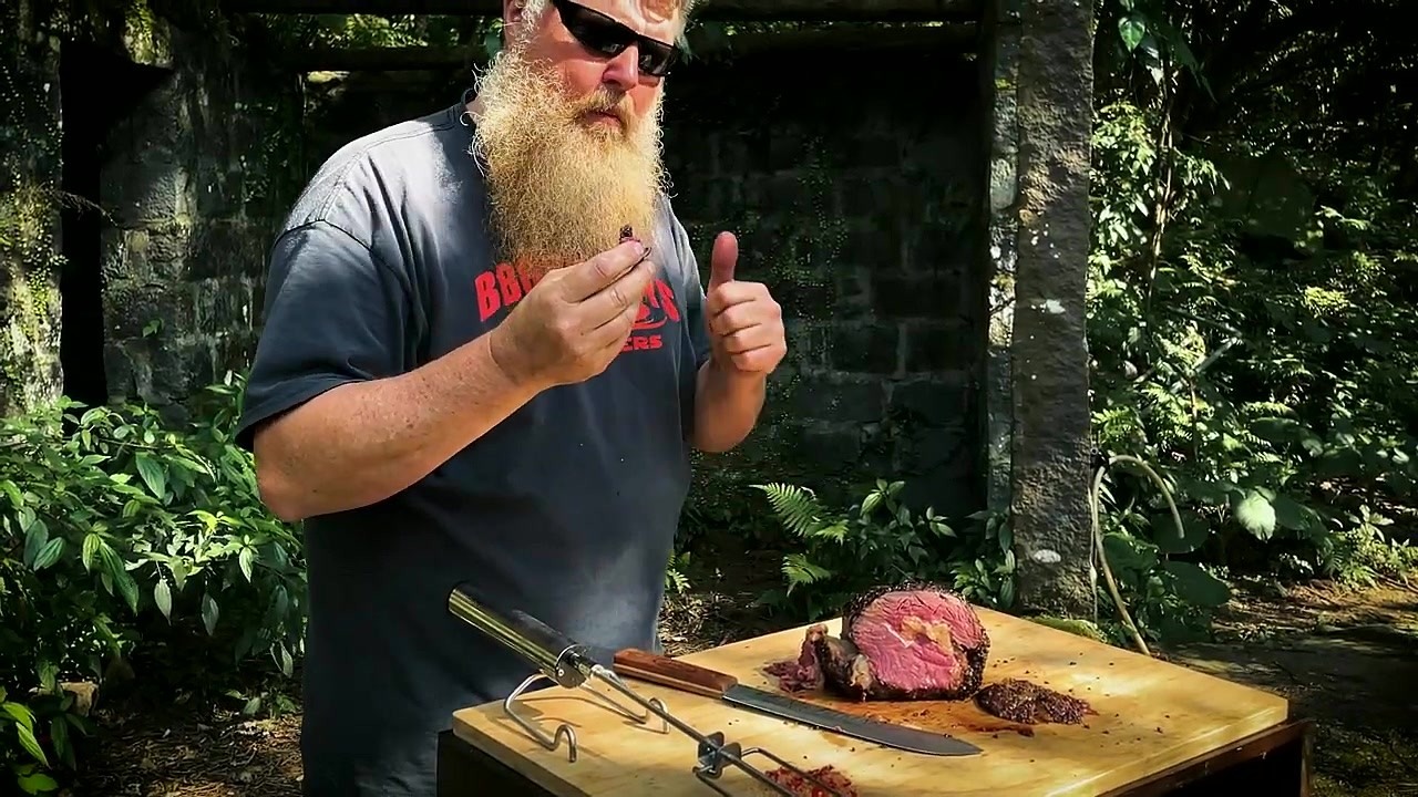 Rib eye steaks sear directly on coals