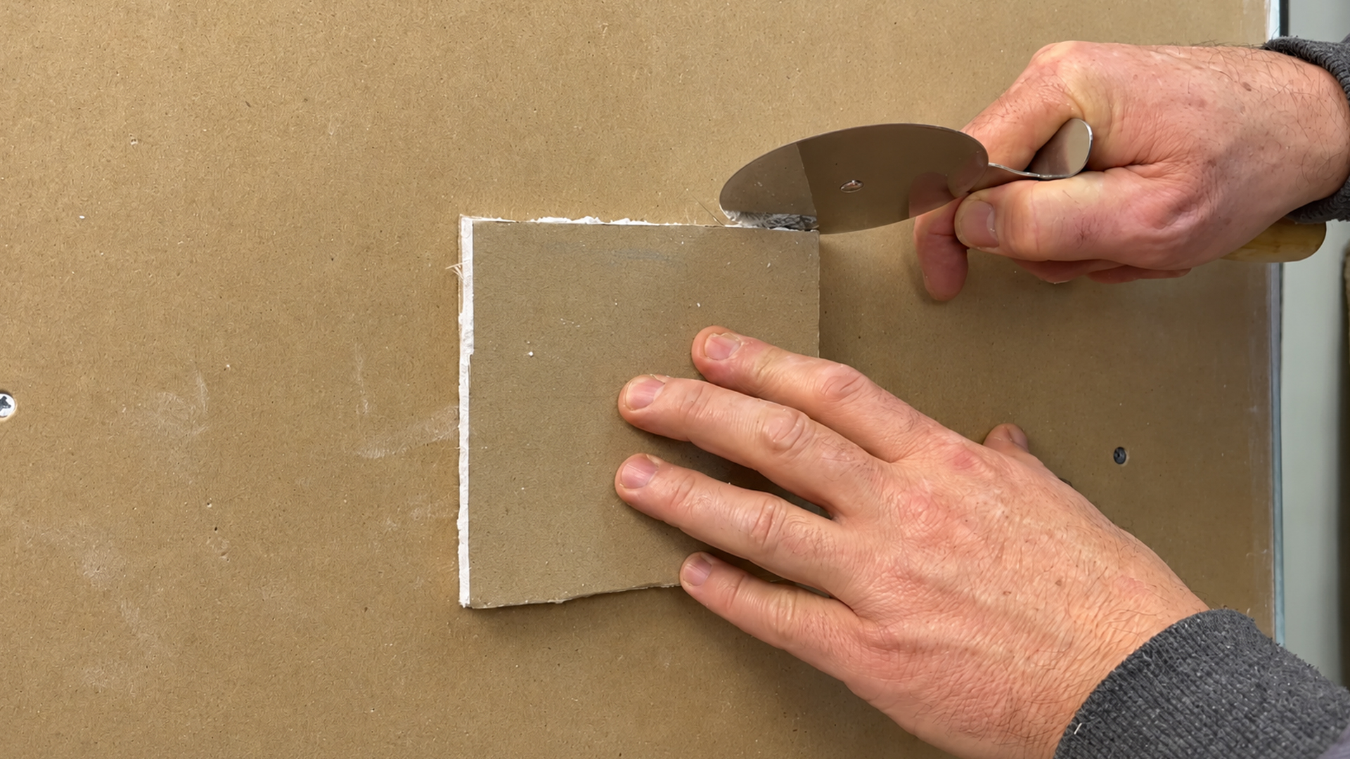 How to patch a hole in drywall using backing supports and joint compound