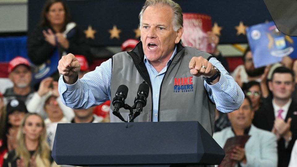 Republican candidate for Senate Mike Rogers speaks at a midterm campaign rally at CHI Aviation in Howell, Michigan, on October 27. - Saul Loeb/AFP/Pool/Getty Images