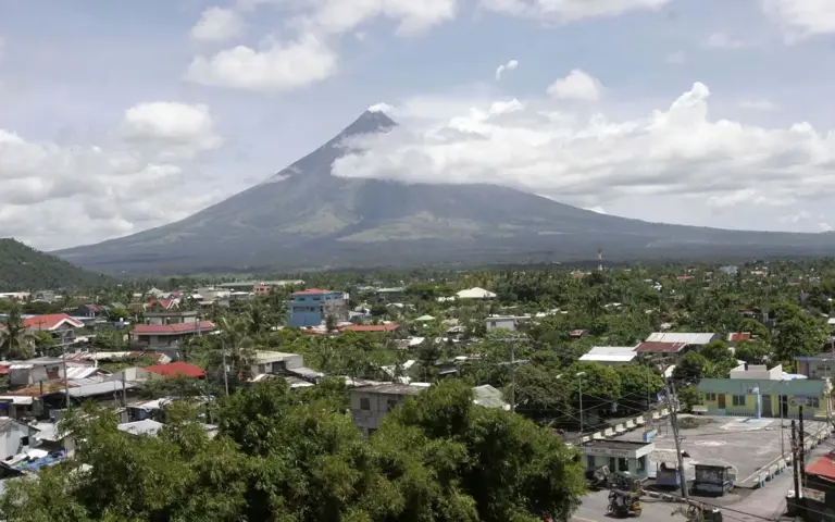 Philippines raises volcano alert level as blast sends ash skyward