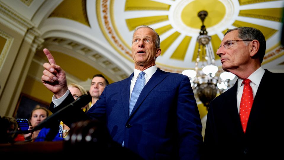 Senate Majority Leader John Thune, accompanied by Senate Majority Whip John Barrasso, speaks to reporters following a Republican policy luncheon at the US Capitol building on September 29 in Washington, DC. - Andrew Harnik/Getty Images/File