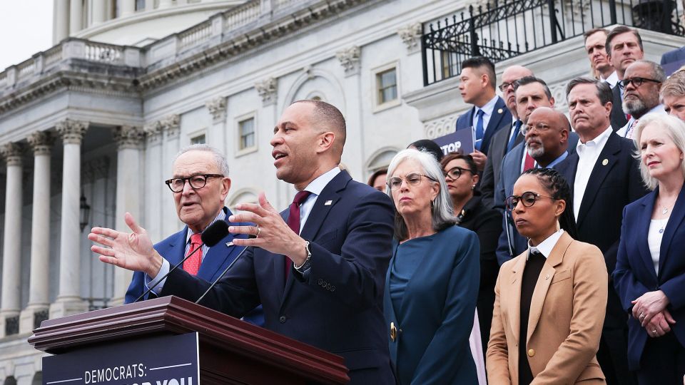 House Democratic Leader Hakeem Jeffries speaks alongside Senate Democratic Leader Chuck Schumer on the steps of the US Senate during an event with congressional Democrats on May 21 in Washington, DC. - Win McNamee/Getty Images