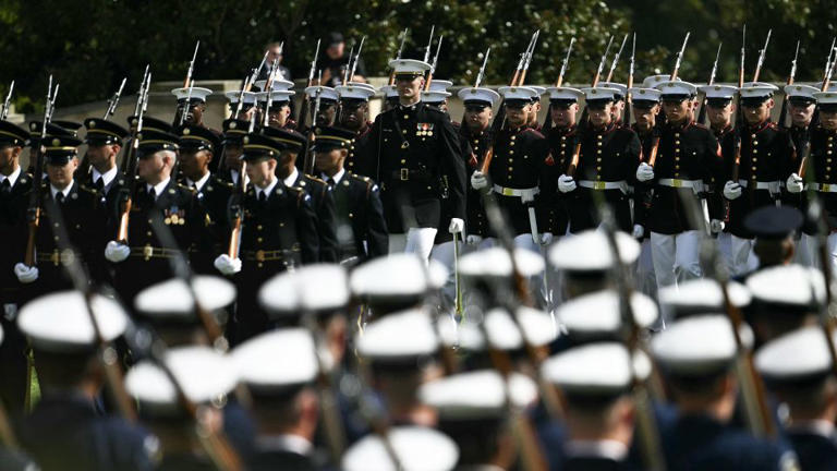 Members of the US military parade during the 2026 National POW/MIA Recognition Day Ceremony at the Pentagon in Washington, DC on September 18, 2026. - Kent Nishimura/AFP/Getty Images
