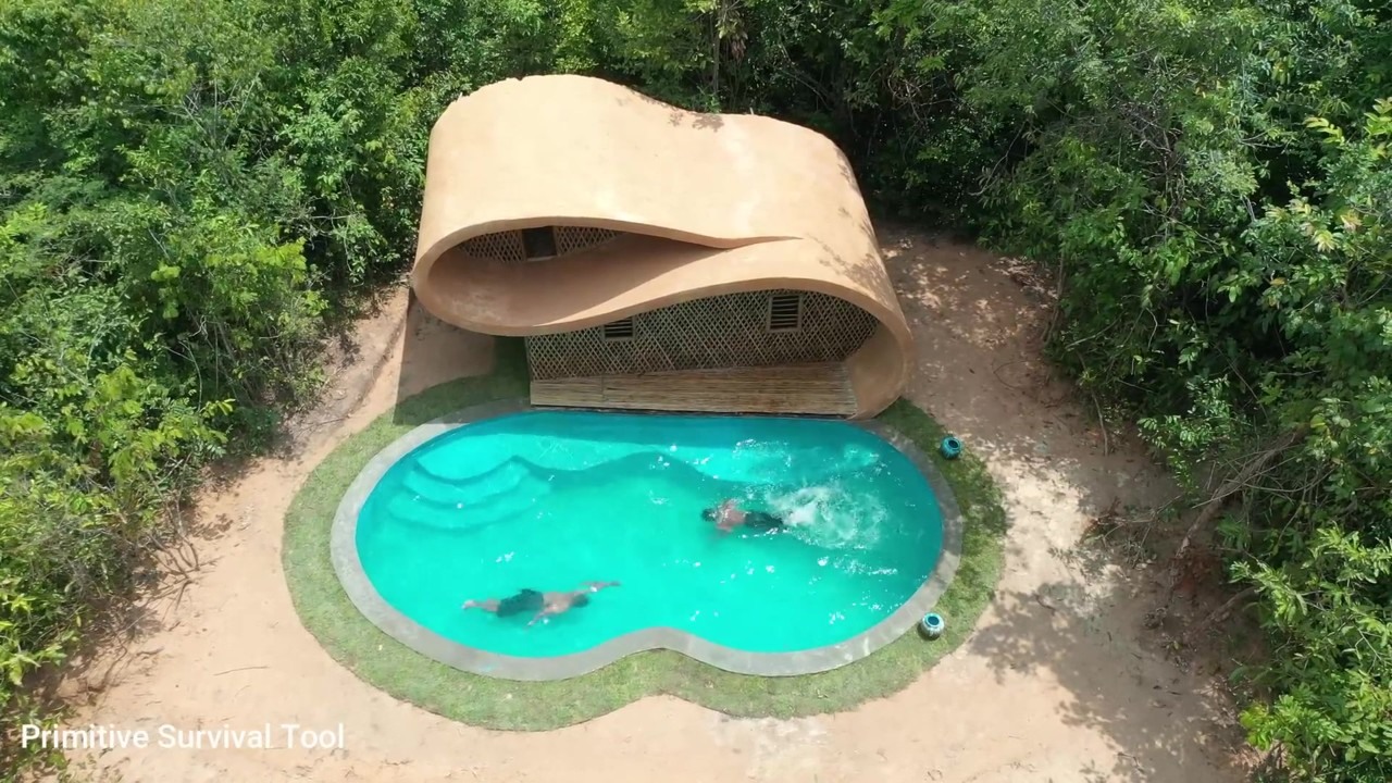 Two-story bamboo villa with a pool from above