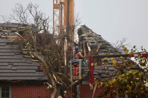 Crews start clearing fallen tree that smashed through Darlington home ...