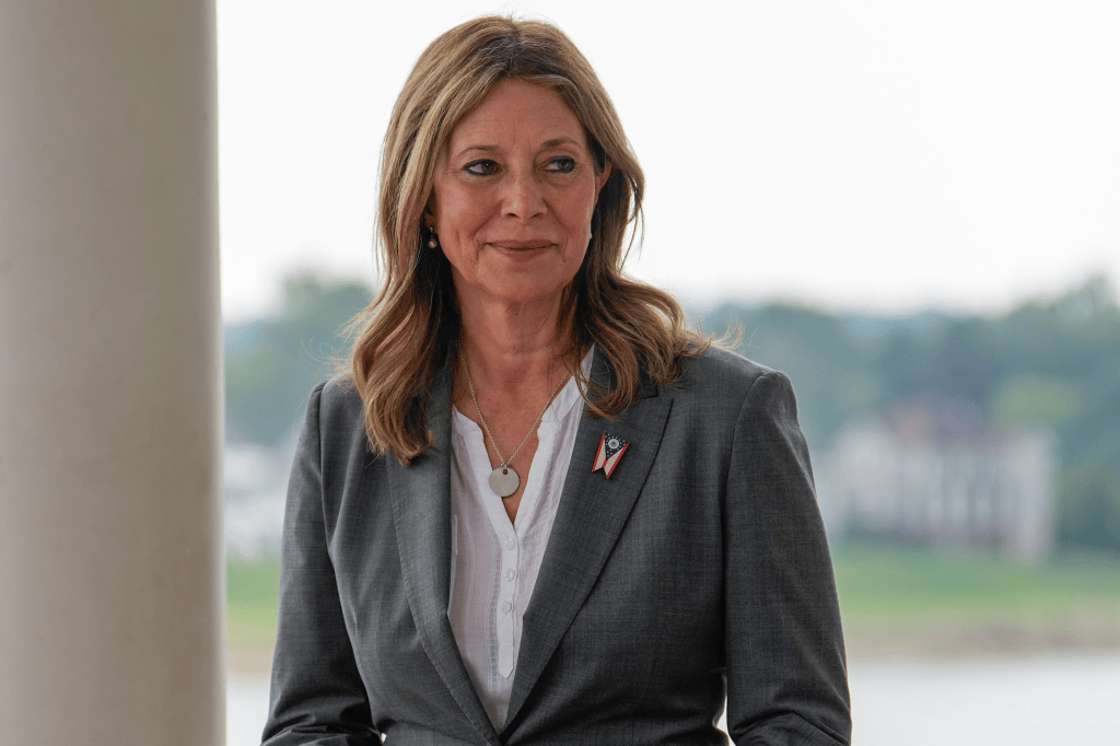 Dr. Amy Acton participates in a campaign event along the Ohio River, seen behind, in Marietta, Ohio, September 17, 2026.