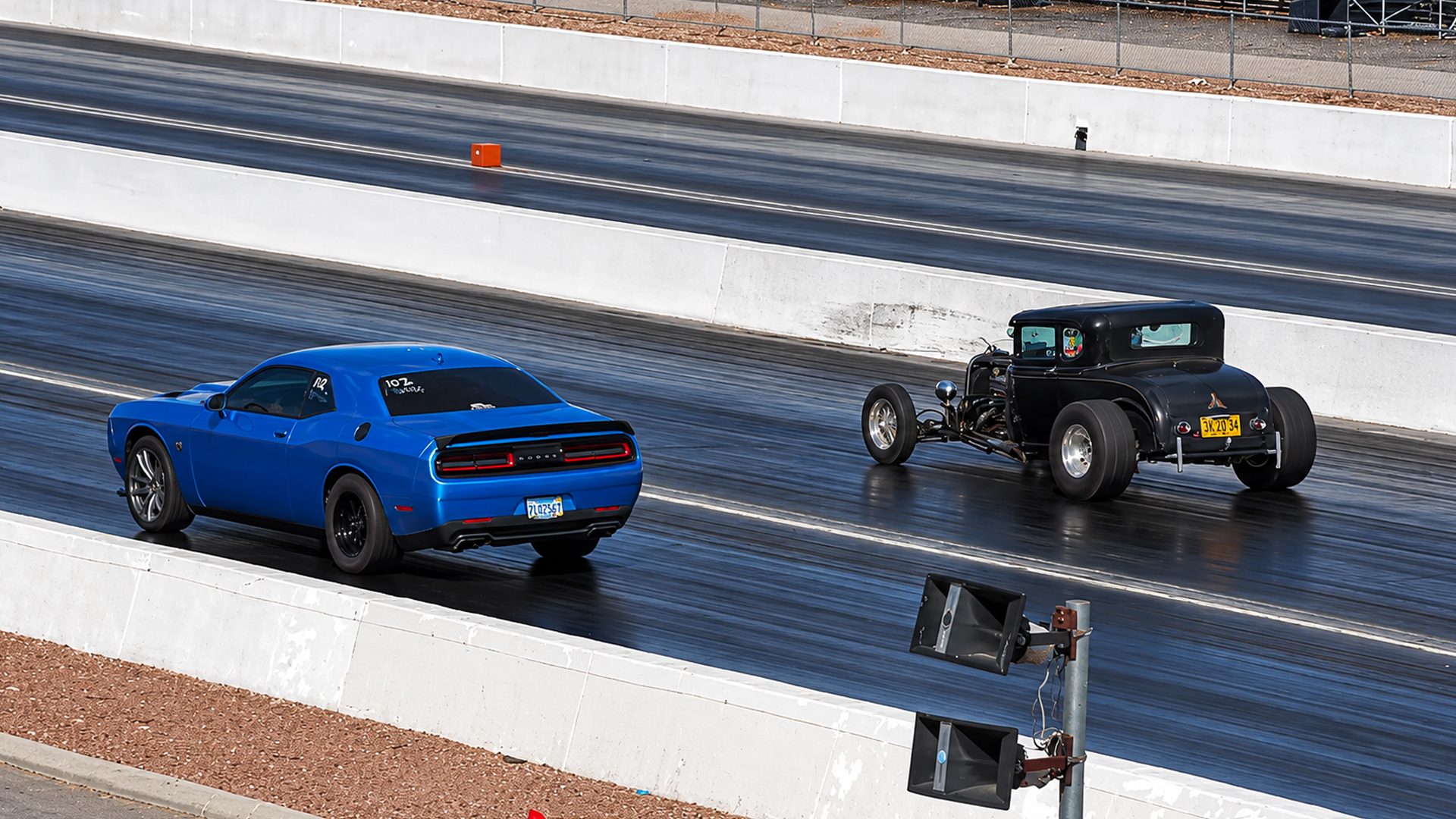 Watch a 797-hp Hellcat Redeye clock a 9-second run against built muscle