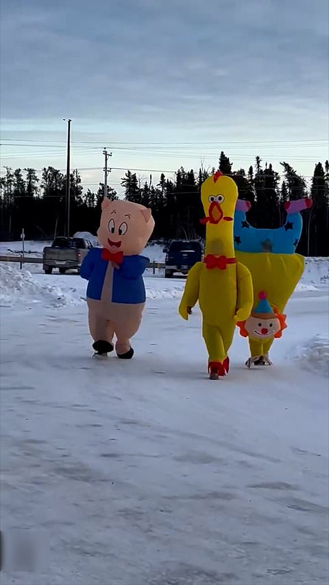 Teachers compete in inflatable costume race after school