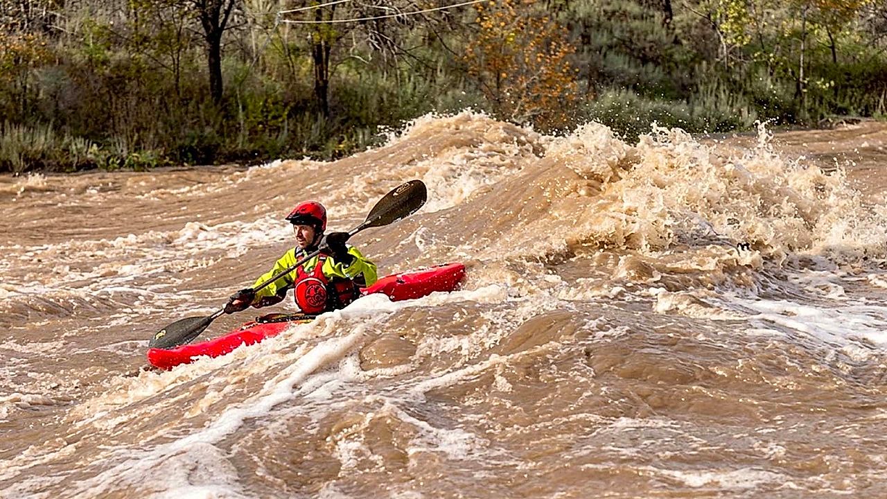 Kayakers take on flooded Animas River at its highest level in over 50 years