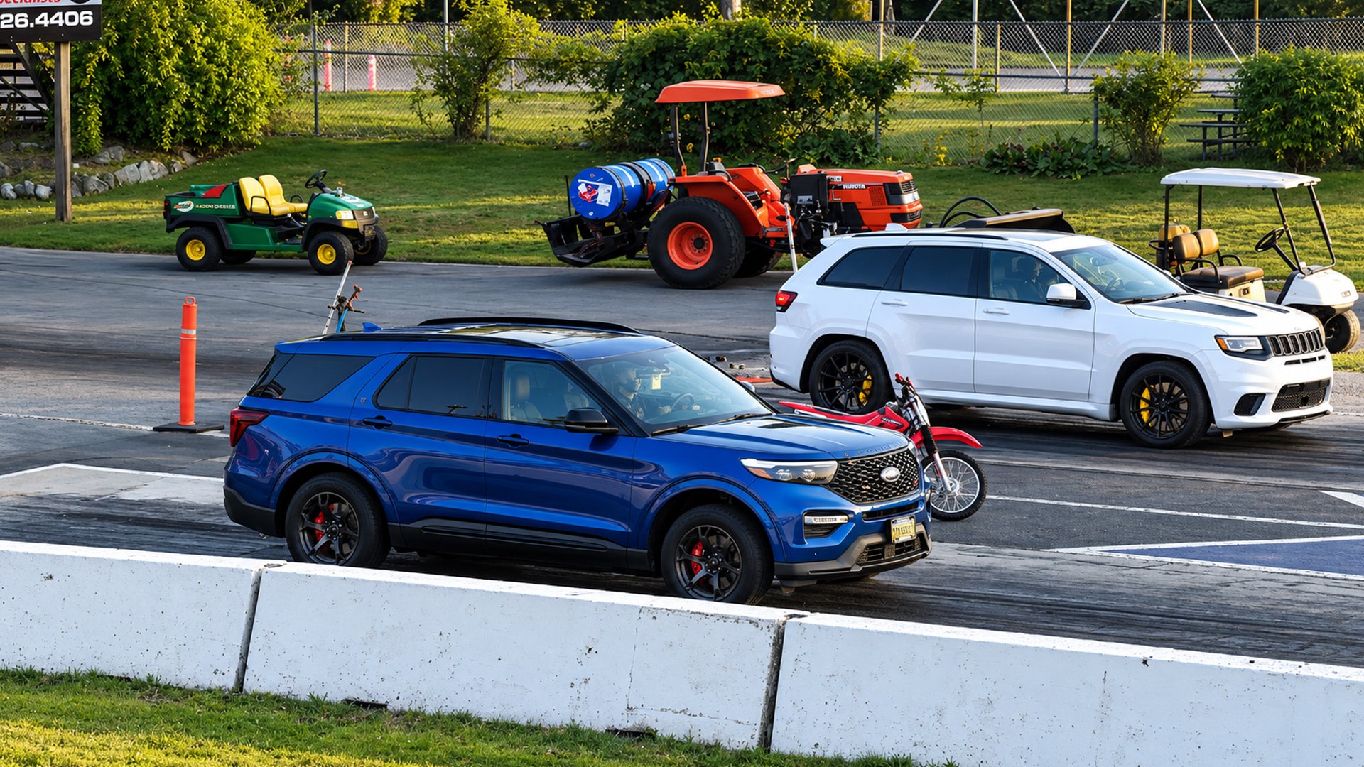 A Jeep Grand Cherokee SRT runs 11-second passes against an Explorer
